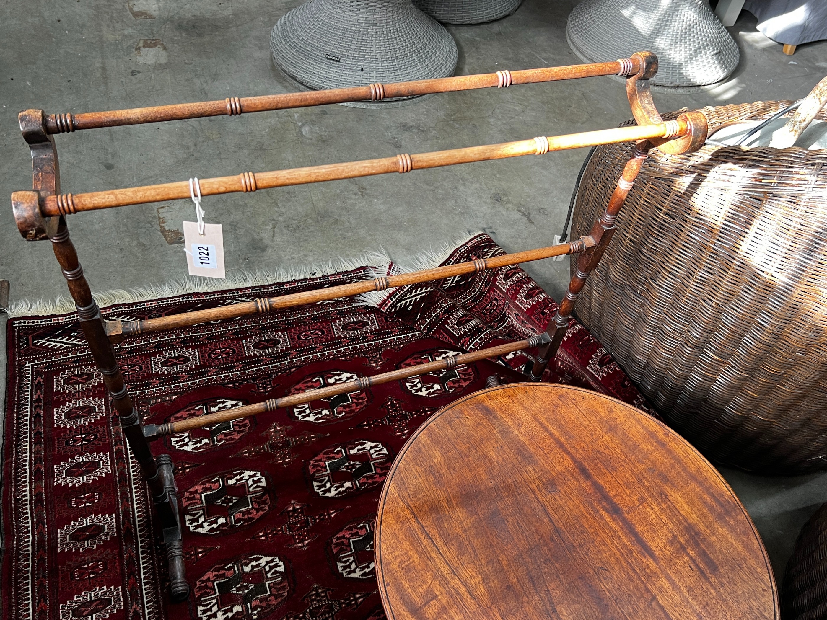 A Victorian mahogany towel rail, height 82cm and a Victorian and later circular occasional table